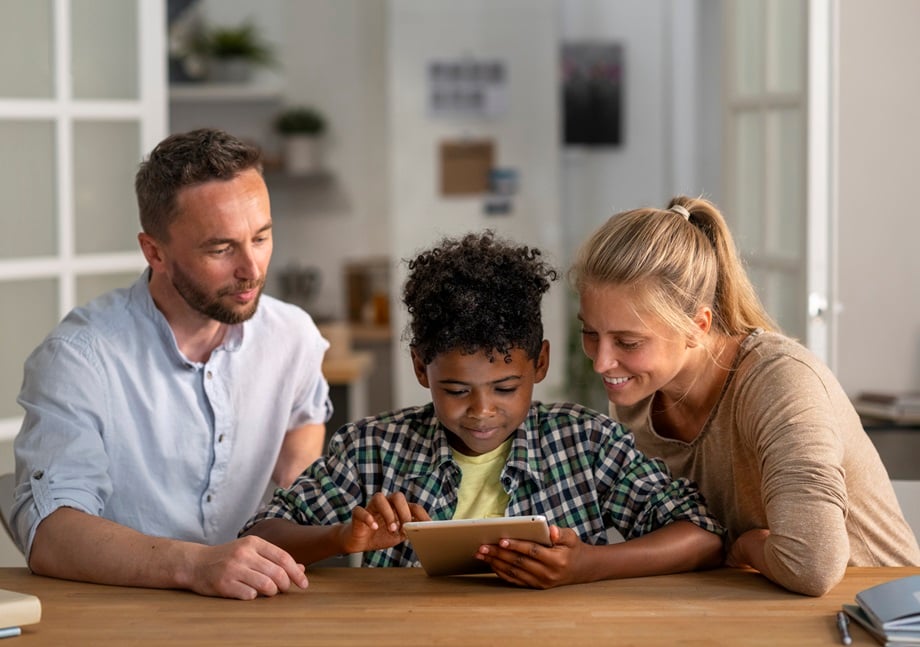 front-view-parents-kid-with-tablet